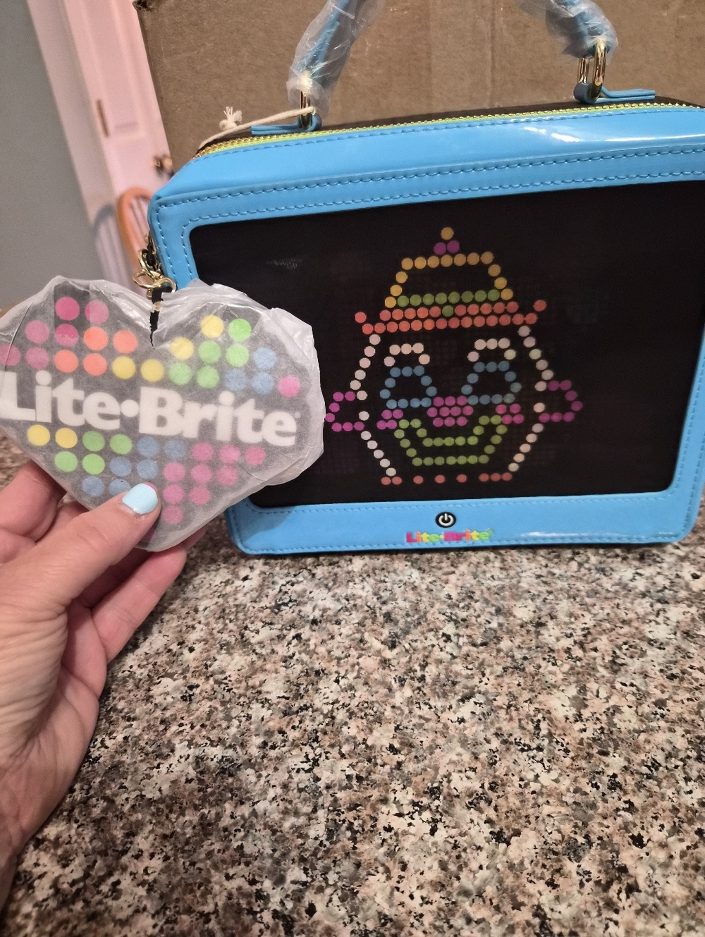 Loungefly Lite-Brite Lenticular Crossbody Bag.